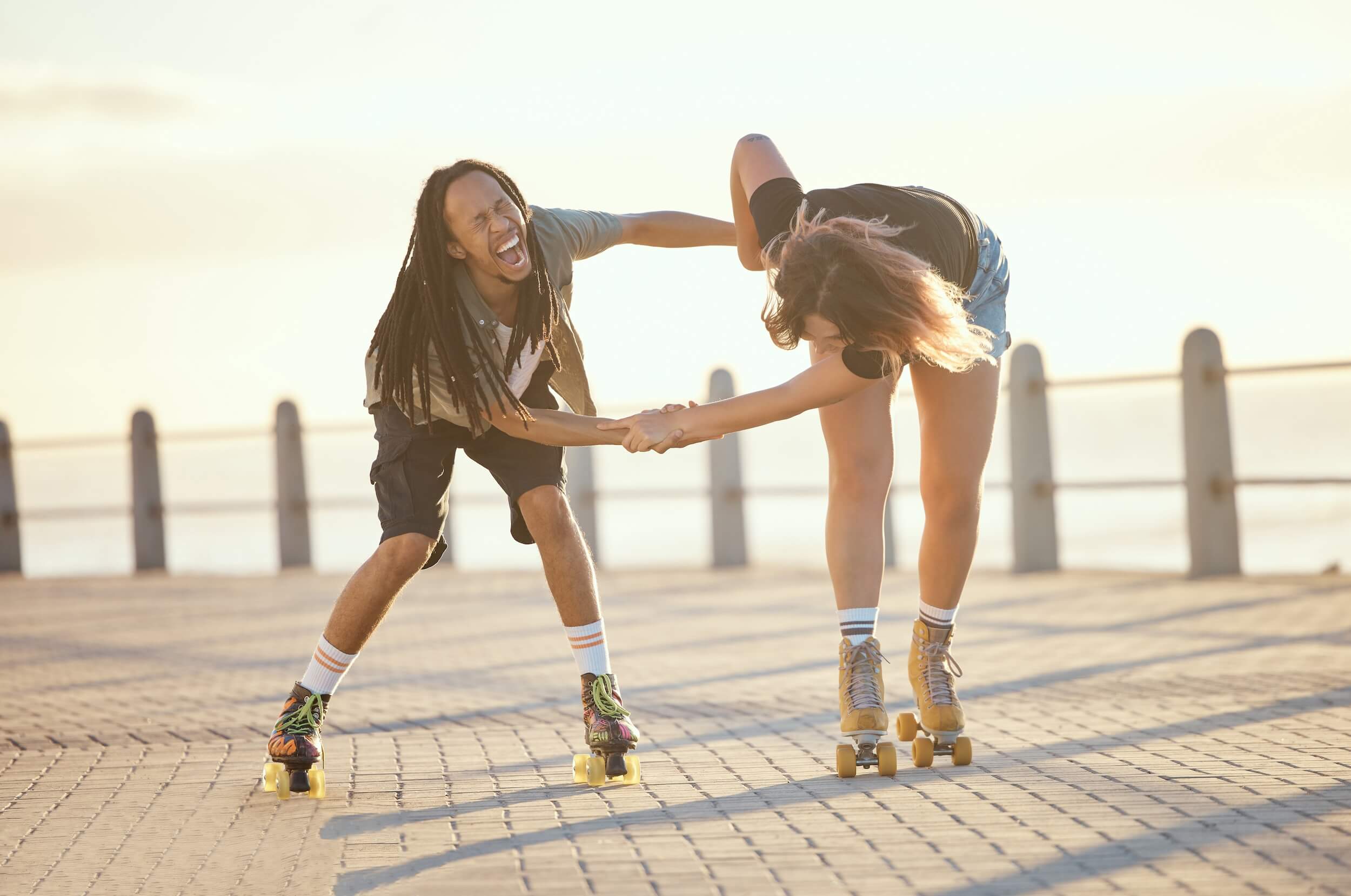 a couple rollerblading and living joyfully